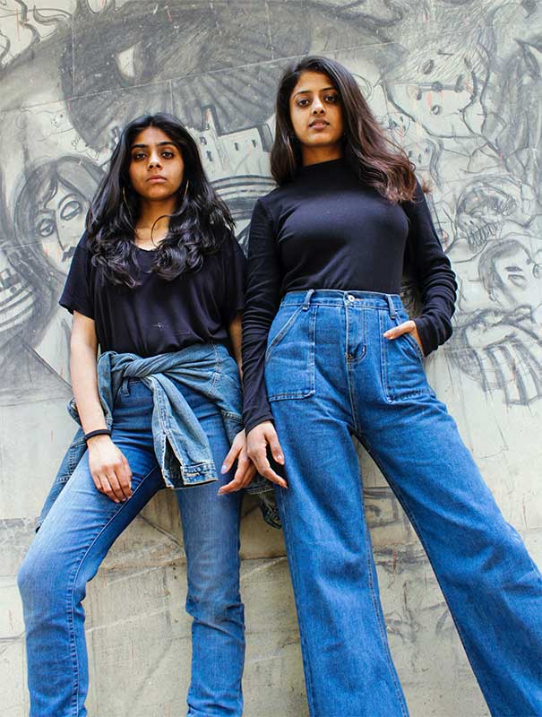 2 girls in jeans and top